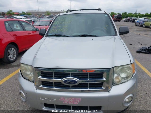 12641137 :رقم المزاد ، 1FMCU03GX9KA34888 vin ، 2009 Ford Escape Xlt مزاد بيع