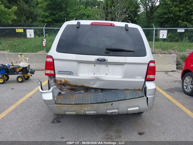 12641137 :رقم المزاد ، 1FMCU03GX9KA34888 vin ، 2009 Ford Escape Xlt مزاد بيع