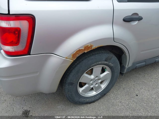 12641137 :رقم المزاد ، 1FMCU03GX9KA34888 vin ، 2009 Ford Escape Xlt مزاد بيع
