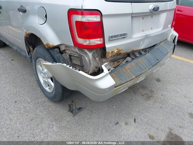 12641137 :رقم المزاد ، 1FMCU03GX9KA34888 vin ، 2009 Ford Escape Xlt مزاد بيع