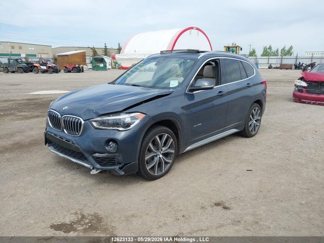 WBXHT3C30G5E52129 BMW X1 Xdrive28i