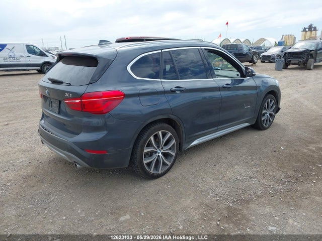 WBXHT3C30G5E52129 BMW X1 Xdrive28i