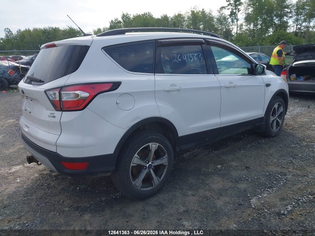 2017 Ford Escape Se მანქანა იყიდება აუქციონზე, vin: 1FMCU9G93HUD69753, აუქციონის ნომერი: 12641363
