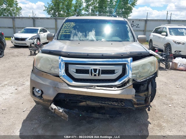 Продажа на аукционе авто 2011 Honda Pilot Touring, vin: 5FNYF4H9XBB501297, номер лота: 12641371