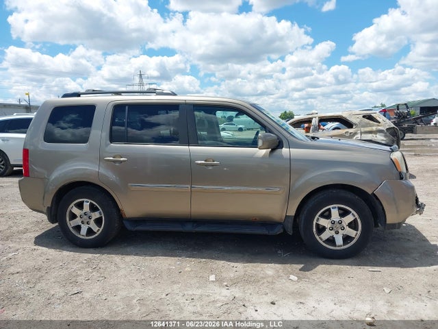 Продажа на аукционе авто 2011 Honda Pilot Touring, vin: 5FNYF4H9XBB501297, номер лота: 12641371