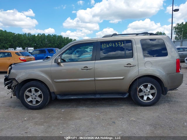 Продажа на аукционе авто 2011 Honda Pilot Touring, vin: 5FNYF4H9XBB501297, номер лота: 12641371