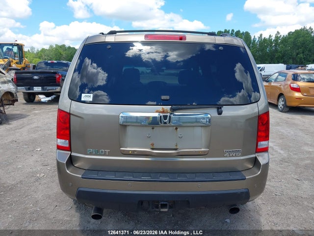 Продажа на аукционе авто 2011 Honda Pilot Touring, vin: 5FNYF4H9XBB501297, номер лота: 12641371