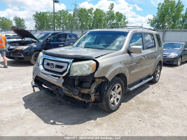Продажа на аукционе авто 2011 Honda Pilot Touring, vin: 5FNYF4H9XBB501297, номер лота: 12641371