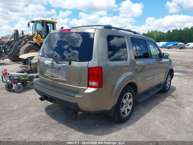 Продажа на аукционе авто 2011 Honda Pilot Touring, vin: 5FNYF4H9XBB501297, номер лота: 12641371