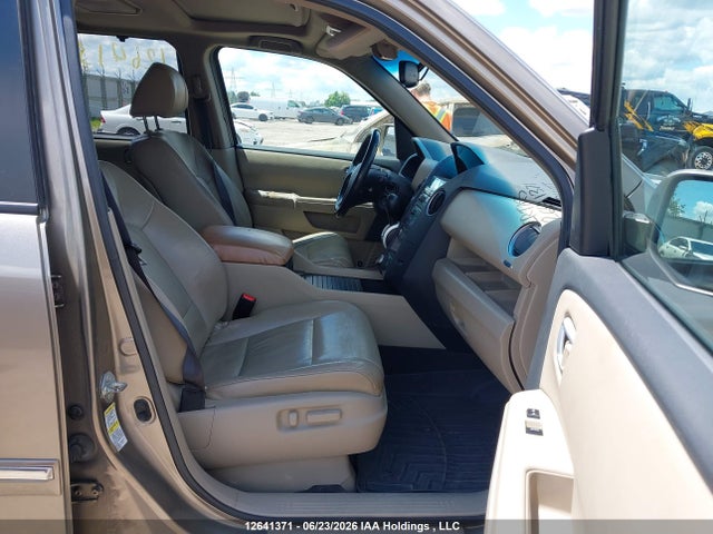 Продажа на аукционе авто 2011 Honda Pilot Touring, vin: 5FNYF4H9XBB501297, номер лота: 12641371