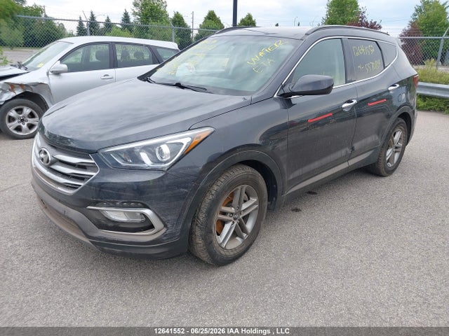 2018 Hyundai Santa Fe მანქანა იყიდება აუქციონზე, vin: 5XYZT3LB8JG557084, აუქციონის ნომერი: 12641552