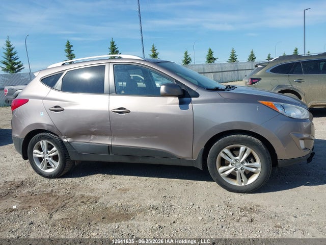12641635 :رقم المزاد ، KM8JUCAC2CU400394 vin ، 2012 Hyundai Tucson Gls مزاد بيع