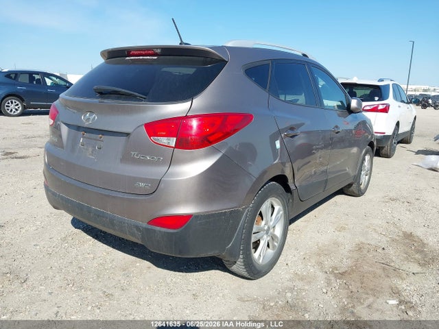 12641635 :رقم المزاد ، KM8JUCAC2CU400394 vin ، 2012 Hyundai Tucson Gls مزاد بيع