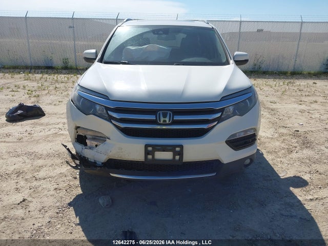 Продаж на аукціоні авто 2017 Honda Pilot Touring, vin: 5FNYF6H96HB508803, номер лоту: 12642275