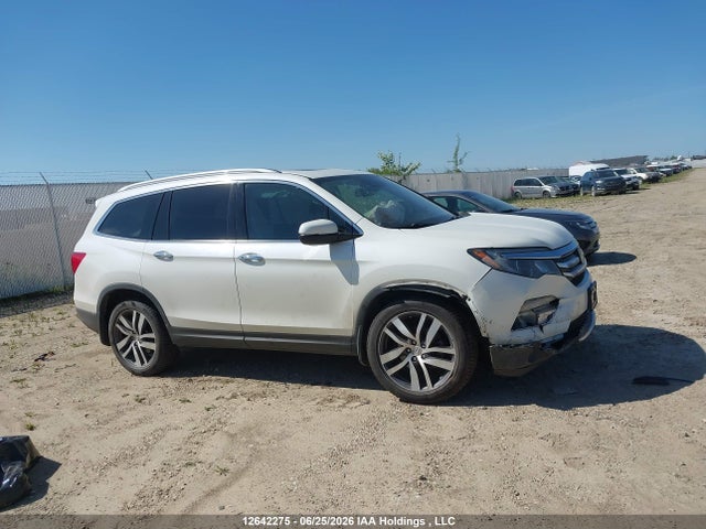 Продаж на аукціоні авто 2017 Honda Pilot Touring, vin: 5FNYF6H96HB508803, номер лоту: 12642275