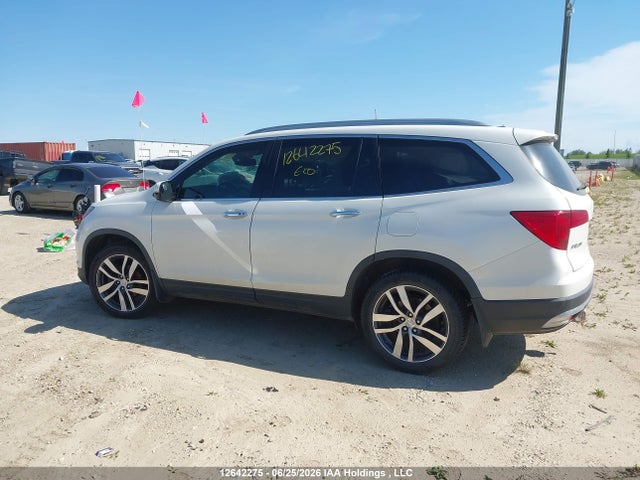 Продаж на аукціоні авто 2017 Honda Pilot Touring, vin: 5FNYF6H96HB508803, номер лоту: 12642275