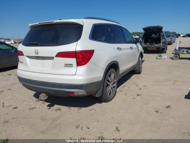 Продаж на аукціоні авто 2017 Honda Pilot Touring, vin: 5FNYF6H96HB508803, номер лоту: 12642275