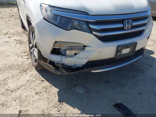 Продаж на аукціоні авто 2017 Honda Pilot Touring, vin: 5FNYF6H96HB508803, номер лоту: 12642275