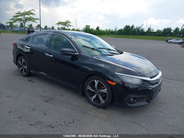 Продажа на аукционе авто 2017 Honda Civic Touring, vin: 2HGFC1F92HH106455, номер лота: 12642399