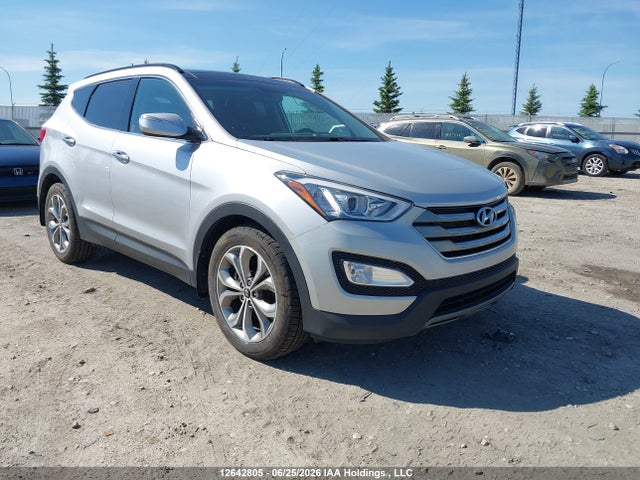 2014 Hyundai Santa Fe Sport 2.0t Limited მანქანა იყიდება აუქციონზე, vin: 5XYZUDLAXEG181309, აუქციონის ნომერი: 12642805