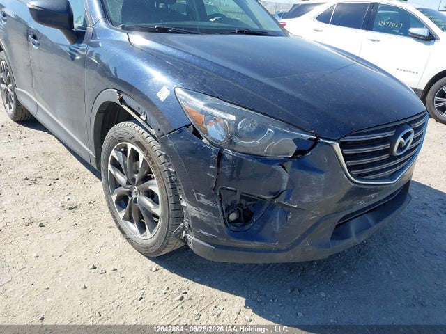 12642884 :رقم المزاد ، JM3KE4DY6G0694695 vin ، 2016 Mazda Cx-5 Gt مزاد بيع