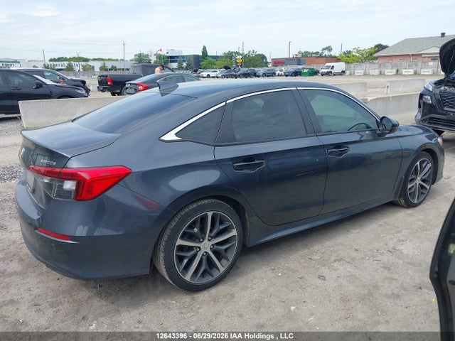 2024 Honda Civic Touring მანქანა იყიდება აუქციონზე, vin: 2HGFE1F95RH002957, აუქციონის ნომერი: 12643396