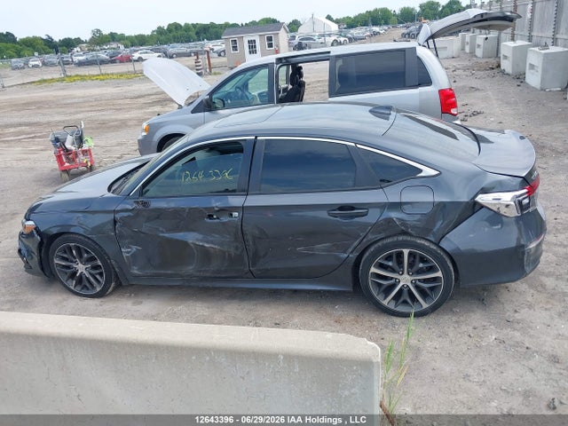 2024 Honda Civic Touring მანქანა იყიდება აუქციონზე, vin: 2HGFE1F95RH002957, აუქციონის ნომერი: 12643396