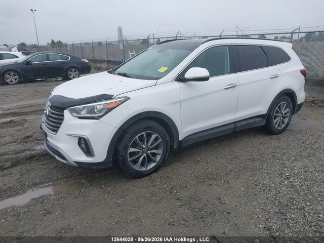 12644028 :رقم المزاد ، KM8SNDHF2JU285607 vin ، 2018 Hyundai Santa Fe Se/limited مزاد بيع