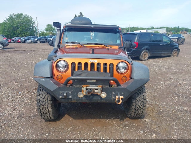 2011 Jeep Wrangler Unlimited Sport მანქანა იყიდება აუქციონზე, vin: 1J4BA3H10BL507979, აუქციონის ნომერი: 12644659