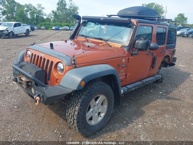 2011 Jeep Wrangler Unlimited Sport მანქანა იყიდება აუქციონზე, vin: 1J4BA3H10BL507979, აუქციონის ნომერი: 12644659