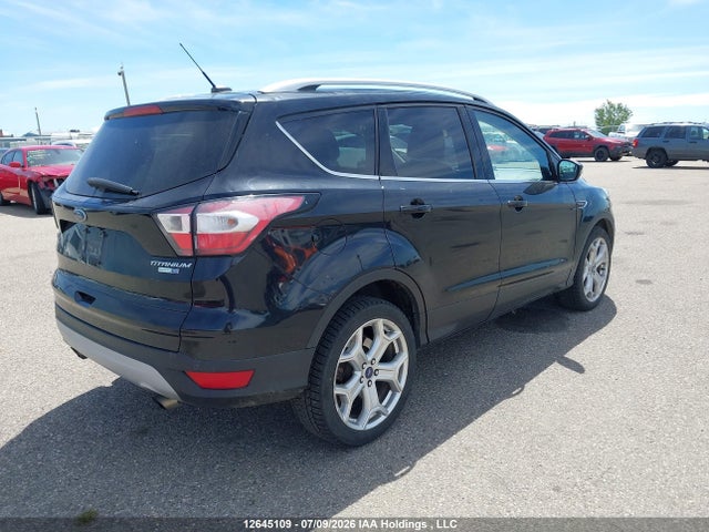 12645109 :رقم المزاد ، 1FMCU9J99HUC69522 vin ، 2017 Ford Escape Titanium مزاد بيع