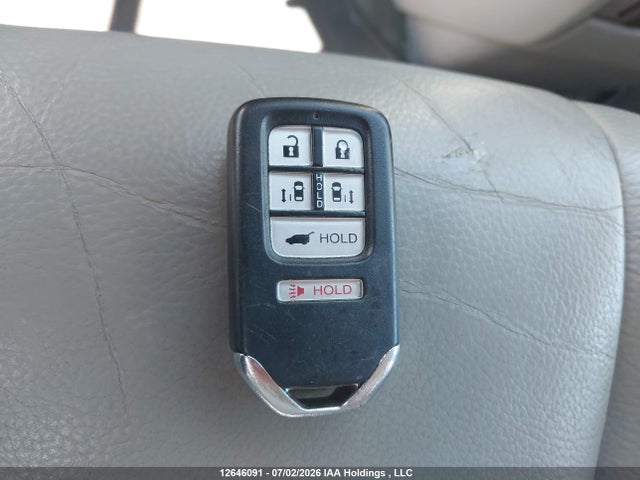 2015 Honda Odyssey Touring მანქანა იყიდება აუქციონზე, vin: 5FNRL5H91FB507787, აუქციონის ნომერი: 12646091