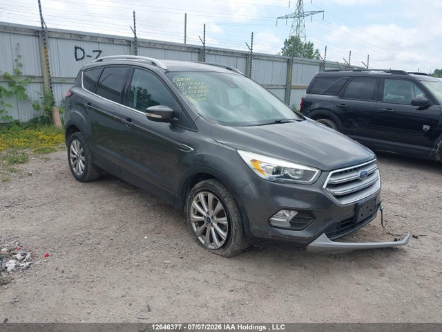 Продаж на аукціоні авто 2017 Ford Escape Titanium, vin: 1FMCU9J9XHUD22258, номер лоту: 12646377