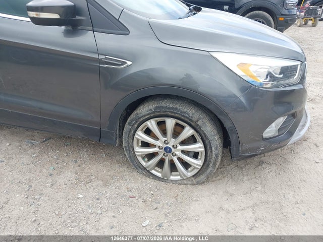 Продаж на аукціоні авто 2017 Ford Escape Titanium, vin: 1FMCU9J9XHUD22258, номер лоту: 12646377