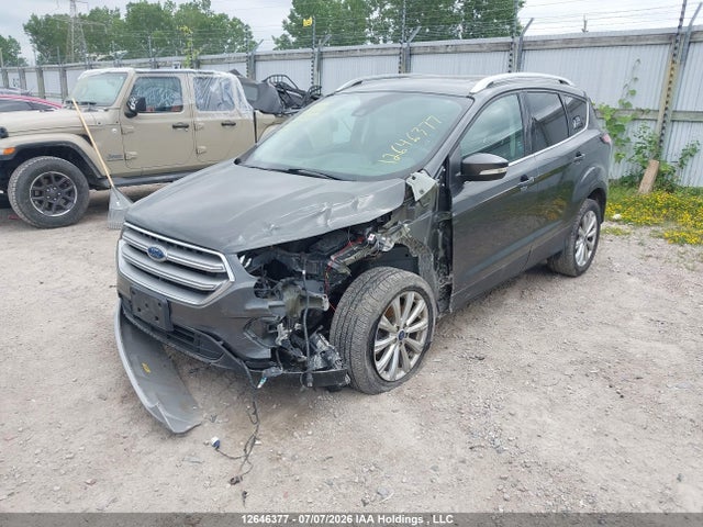Продаж на аукціоні авто 2017 Ford Escape Titanium, vin: 1FMCU9J9XHUD22258, номер лоту: 12646377