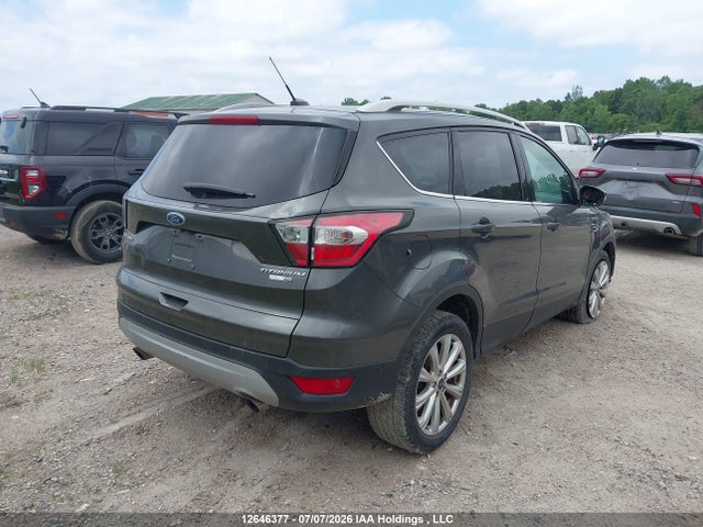 Продаж на аукціоні авто 2017 Ford Escape Titanium, vin: 1FMCU9J9XHUD22258, номер лоту: 12646377