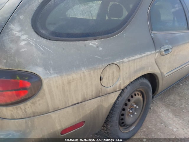 12646650 :رقم المزاد ، 1FAFP58U61G237715 vin ، 2001 Ford Taurus Se مزاد بيع