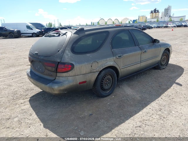 12646650 :رقم المزاد ، 1FAFP58U61G237715 vin ، 2001 Ford Taurus Se مزاد بيع