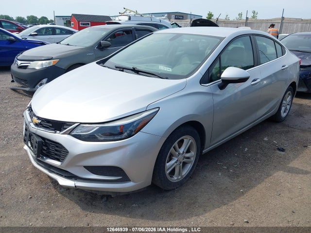 12646939 :رقم المزاد ، 1G1BE5SM4J7151299 vin ، 2018 Chevrolet Cruze Lt Auto مزاد بيع