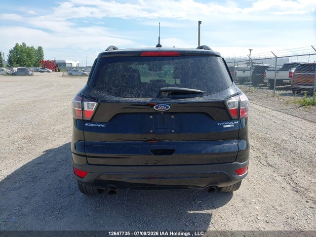 12647735 :رقم المزاد ، 1FMCU9J99HUD31694 vin ، 2017 Ford Escape Titanium مزاد بيع
