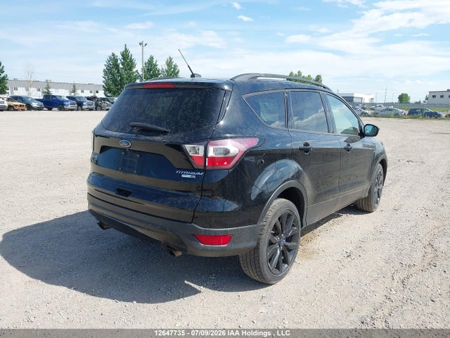 12647735 :رقم المزاد ، 1FMCU9J99HUD31694 vin ، 2017 Ford Escape Titanium مزاد بيع