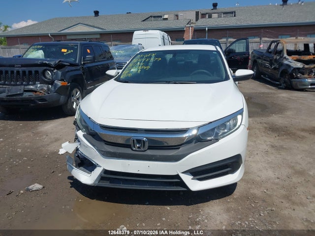 12648379 :رقم المزاد ، 2HGFC2F58JH029843 vin ، 2018 Honda Civic Lx مزاد بيع