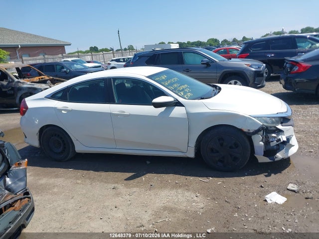 12648379 :رقم المزاد ، 2HGFC2F58JH029843 vin ، 2018 Honda Civic Lx مزاد بيع