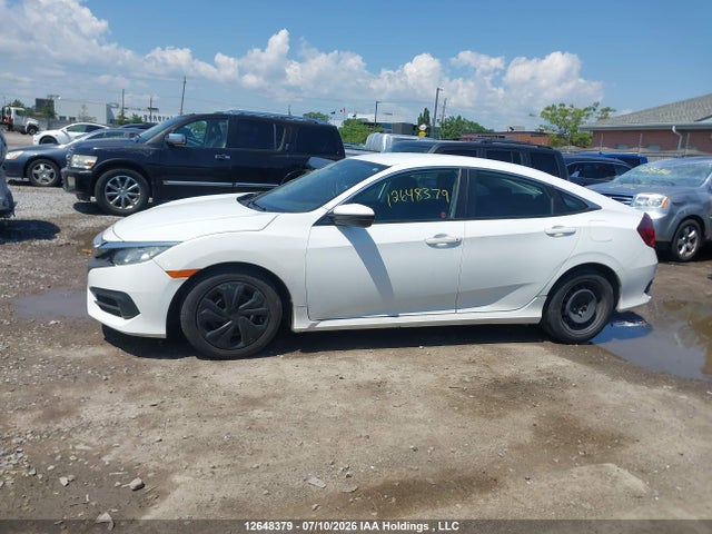 12648379 :رقم المزاد ، 2HGFC2F58JH029843 vin ، 2018 Honda Civic Lx مزاد بيع