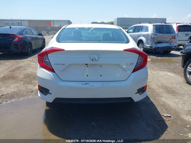 12648379 :رقم المزاد ، 2HGFC2F58JH029843 vin ، 2018 Honda Civic Lx مزاد بيع