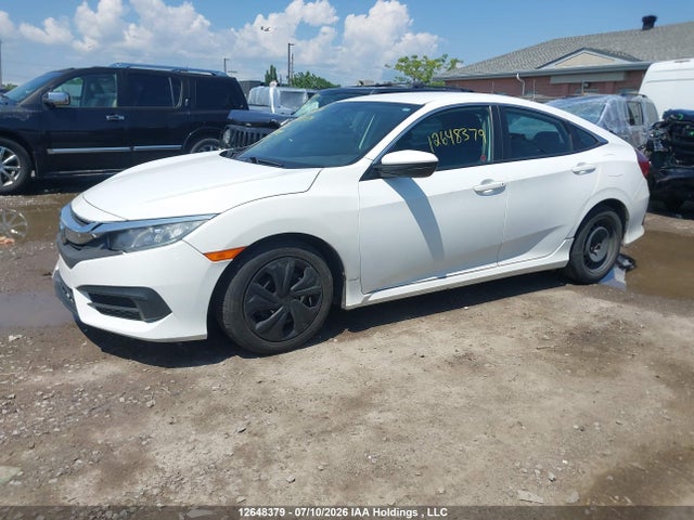 12648379 :رقم المزاد ، 2HGFC2F58JH029843 vin ، 2018 Honda Civic Lx مزاد بيع