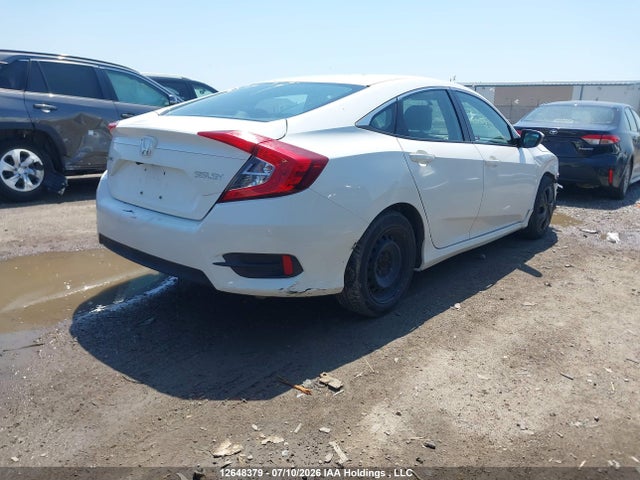 12648379 :رقم المزاد ، 2HGFC2F58JH029843 vin ، 2018 Honda Civic Lx مزاد بيع