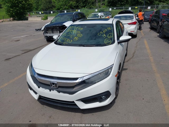 2016 Honda Civic Touring მანქანა იყიდება აუქციონზე, vin: 2HGFC1F94GH115303, აუქციონის ნომერი: 12648691