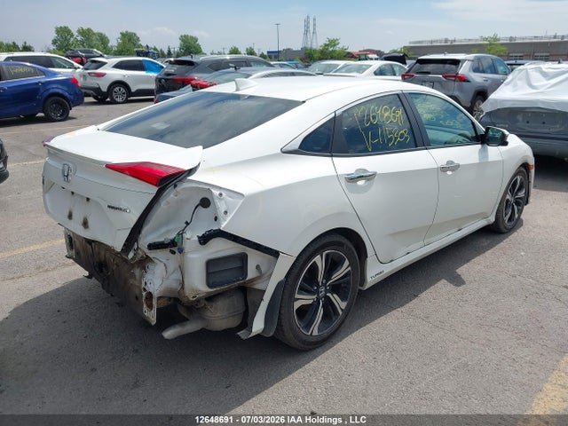 2016 Honda Civic Touring მანქანა იყიდება აუქციონზე, vin: 2HGFC1F94GH115303, აუქციონის ნომერი: 12648691
