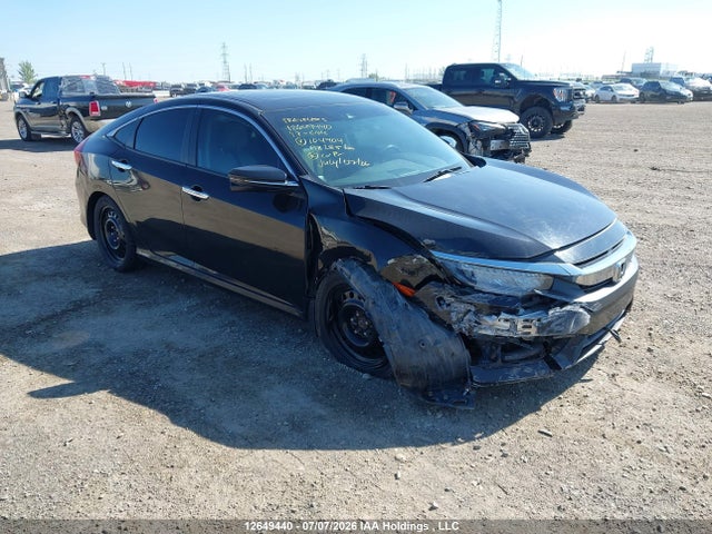2017 Honda Civic Touring მანქანა იყიდება აუქციონზე, vin: 2HGFC1F96HH104904, აუქციონის ნომერი: 12649440